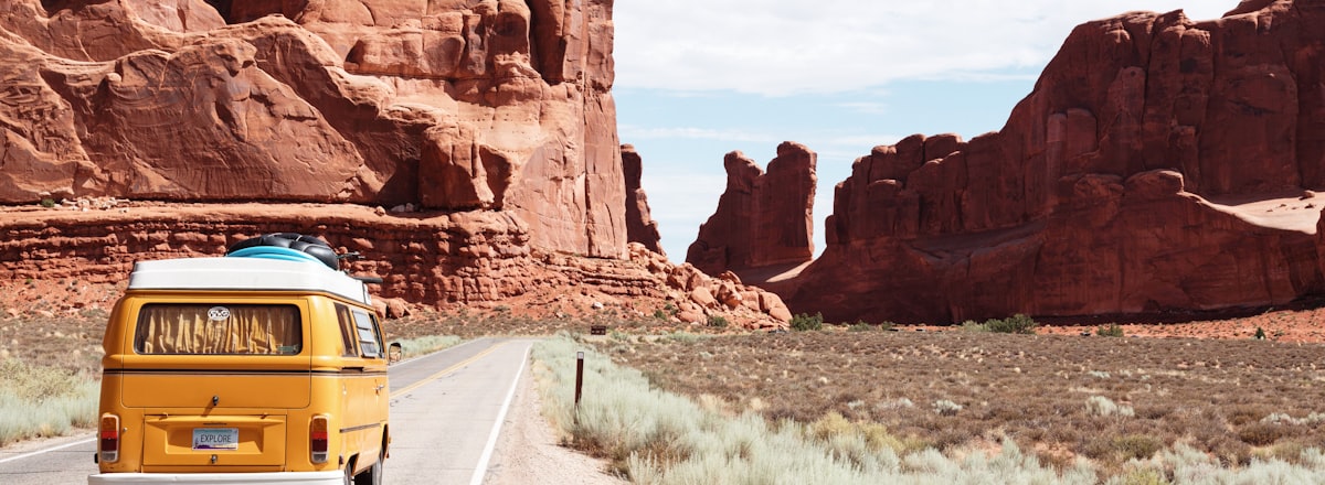 Car driving on a mountain road trip